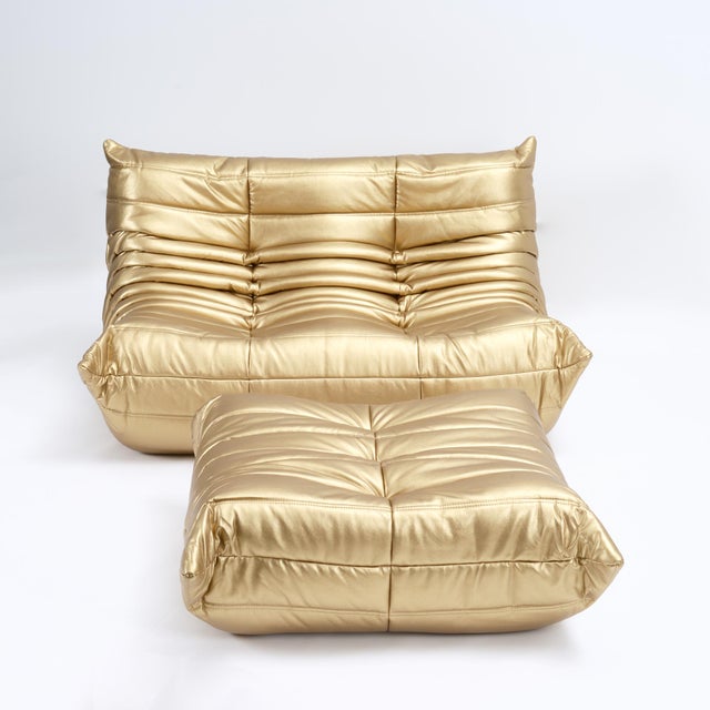 This is an authentic Ligne Roset Togo Loveseat and Ottoman, designed by Michel Ducaroy in 1973 — sourced in Europe and...