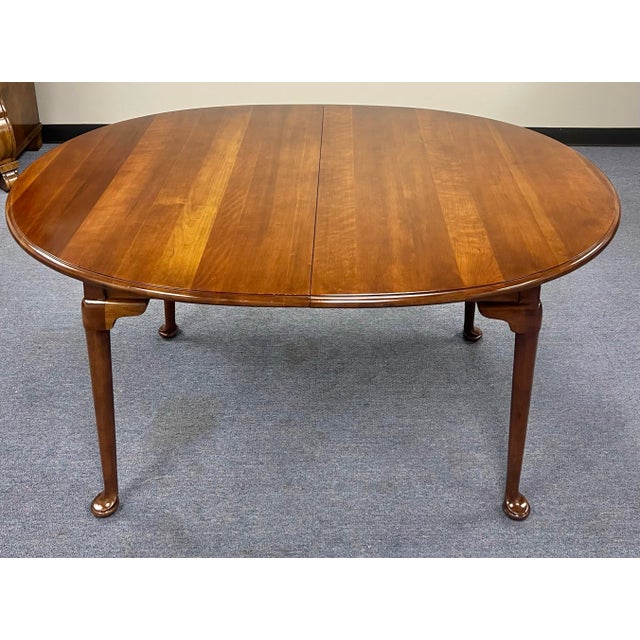 Very nice Oval Queen Anne style extension dining room table by Statton Futniture in their popular Oldtowne finish. The...