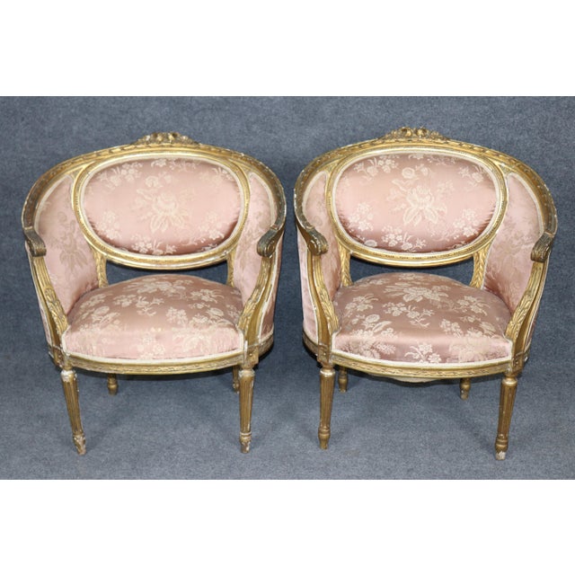 These charming French corbeille-form salon chairs are the kind of pieces that instantly make a room feel...
