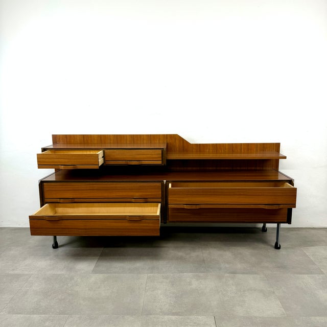 Sideboard and chest of drawers designed in the 1960s. Produced by "Sorgente dei Mobili" of Arosio, Italy. Curved wood...