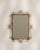 A second Art Deco mirror featuring a more rectilinear silhouette, emphasizing balance and proportion. The brass frame adds...