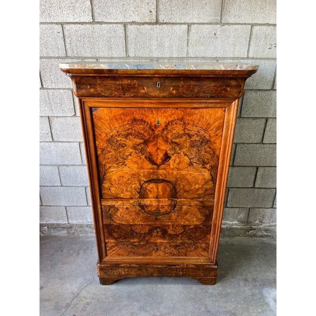 Exceptional Louis Philippe French secrétaire à abattant, dating to the mid-19th century and crafted in richly figured...