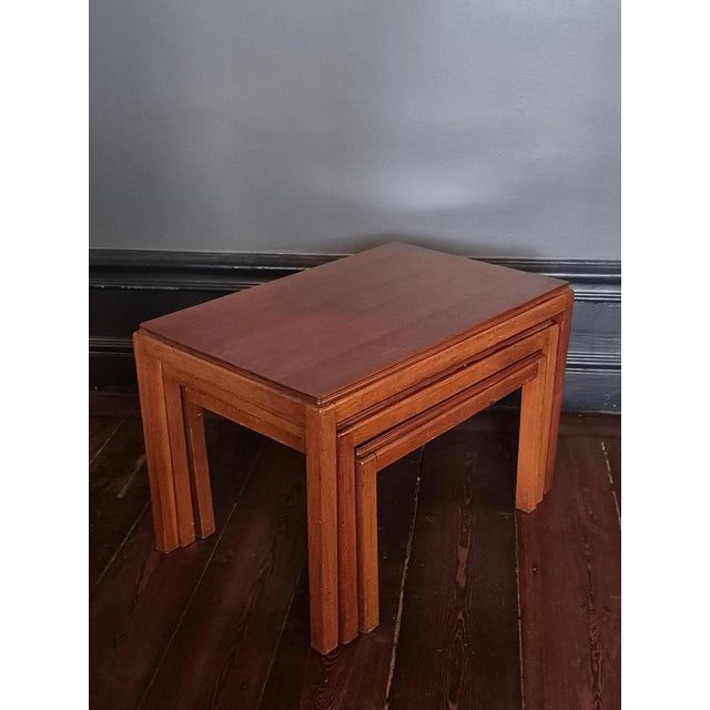 Classic 3 part Nesting table in mahogany by Russell Gordon, Mid-Century Modern. with makers mark under one of the table...