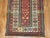 Lovely Caucasian Talish runner from the late 19th century in earth red, blue ivory red and yellow accents. The colorful...