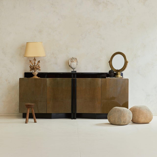 A monumental Italian enfilade credenza, sourced in Parma and dating to the 1980s. Over seven feet wide, the piece is...