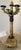 A pair of Charles X or Louis Philippe period patinated bronze and sienna marble five-light candelabra with flame finials,...