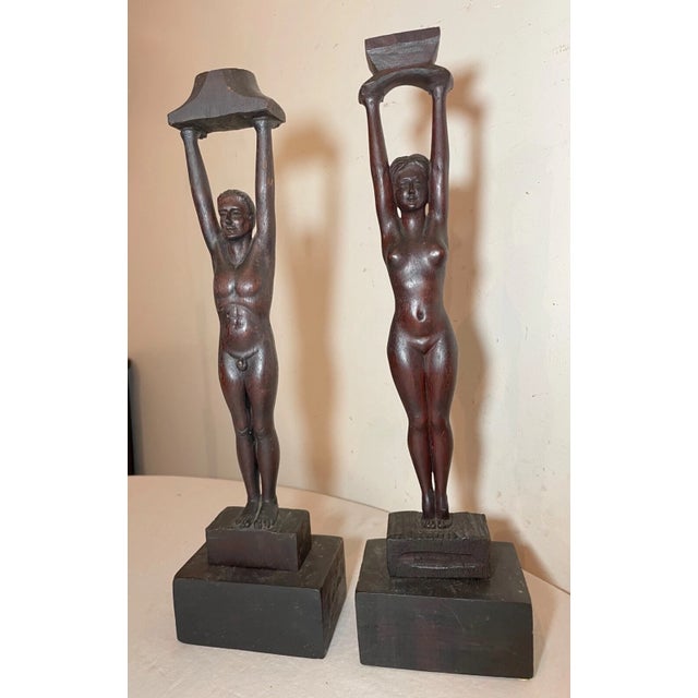 This exquisite pair of sculptural candlesticks are a stunning addition to any collection. Crafted from high-quality wood,...