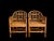 A beautiful pair of Brighton Pavilion style side chairs with cane seats in excellent condition. These could be McGuire....