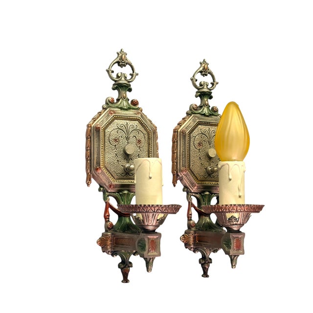 Newly refinished wall sconces from the 1920s We did a silver finish with red and green highlights. New wiring and on board...