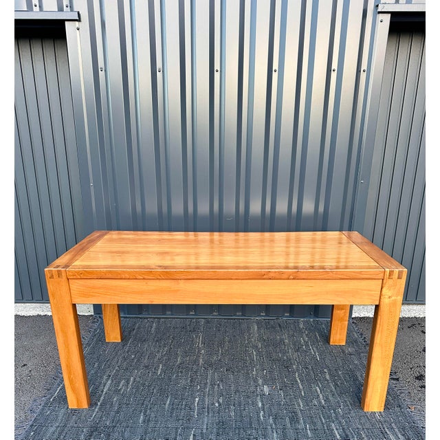 RARE B02 desk in its largest version, in solid Elm, with 3 drawers on the front, in beautiful original condition. This...