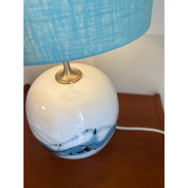 A playful nod to the Japanese decorative spirit of Danish glassworks Homelgaard, the “Sakura” lamp series was designed by...