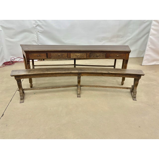 Found in the North of France, this one of a kind 18th Century Crescent Table and Two Benches where handcrafted from walnut...