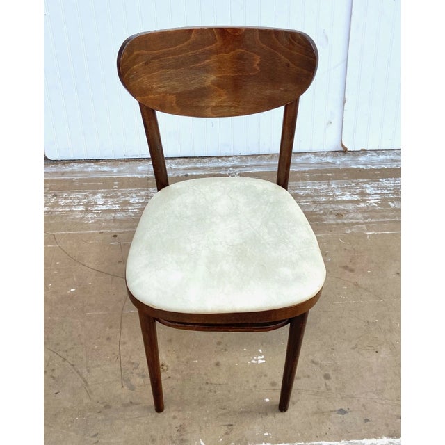 This is a beautiful vintage bentwood banana chair by L&B Productions. It is solid and sturdy, just has one small tear in...