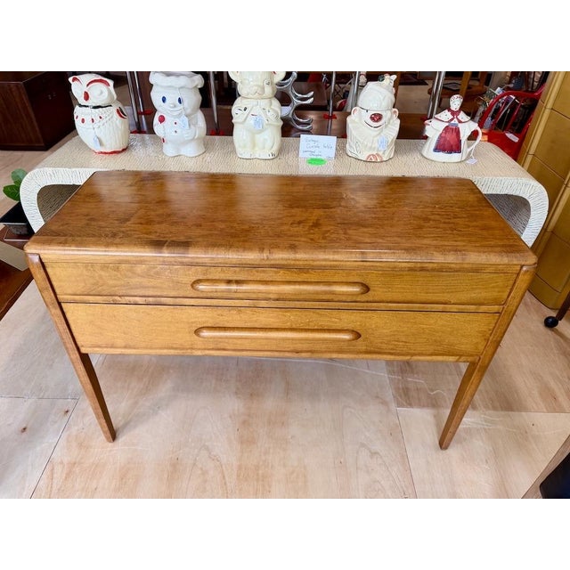 Unique solid maple console/hall table with two spacious drawers. Well made in the late 1940s. No makers mark present. Just...