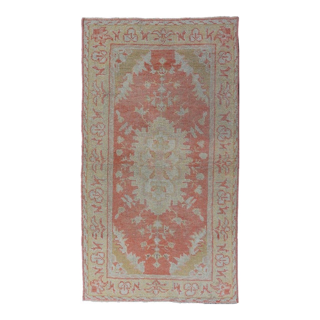Antique Turkish Oushak Rug With Floral Motifs and Coral Background For Sale