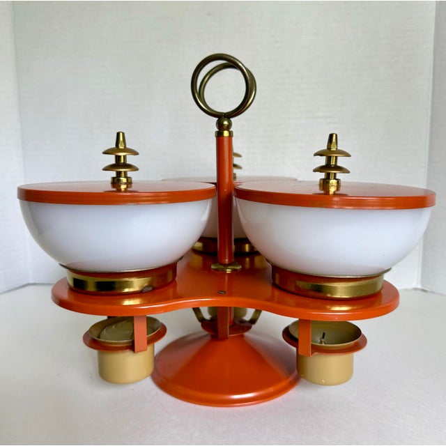 Dating to the 1960s, this striking Mid-Century Modern condiment server perfectly captures the playful optimism and...
