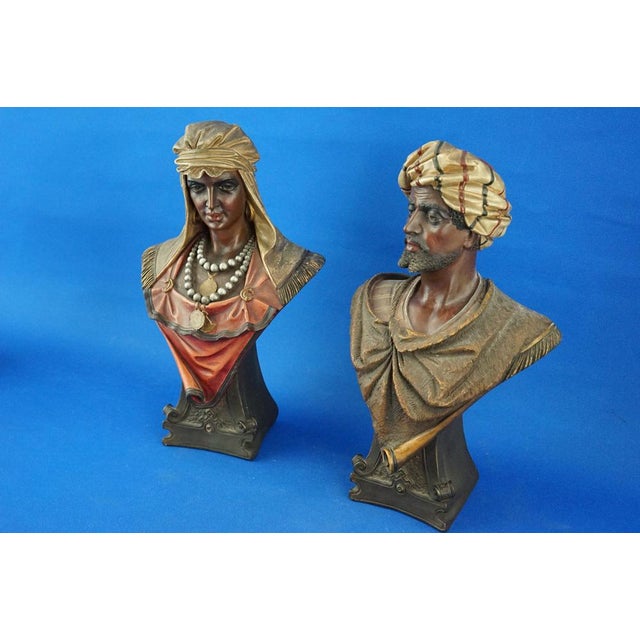 MEASUREMENTS: Man: Height: 26.2 cm; Width: 17 cm; Depth: 10.5 cm; Woman: Height: 27.5 cm; Width: 16.5 cm; Depth: 10.5 cm;...