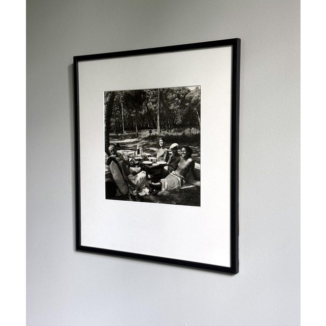 A black and white photograph by Lee Miller (American, 1907-1977) entitled "Picnic, Mougins". This iconic image was taken...