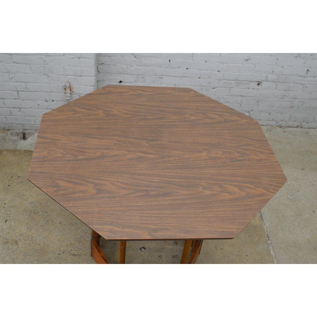 Warren Church Style Octagonal Dining Table W/Extension Leaf. The table is solid wood pedestal base with laminate top and...