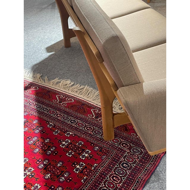 Hans J. Wegner sofa model GE236. Solid, soap-treated oak. New cushions in foam and Gabriel fabric, also new. Supplied by...