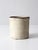 An antique stoneware crock dating to the late 19th to early 20th century, with a creamy white glaze, darkened rim, and...