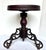 Early 1900s dark wood piano stool with ornate cast iron tripod legs. Beautifully aged wood patina. Versatile furnishing...