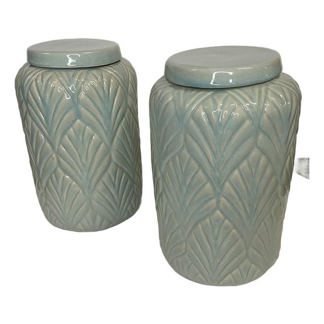 Pair of Celadon Jars With Ginko Leaf Motif For Sale
