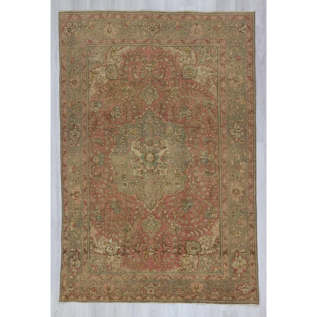 Mid century vintage Persian Tabriz rug. In good condition.