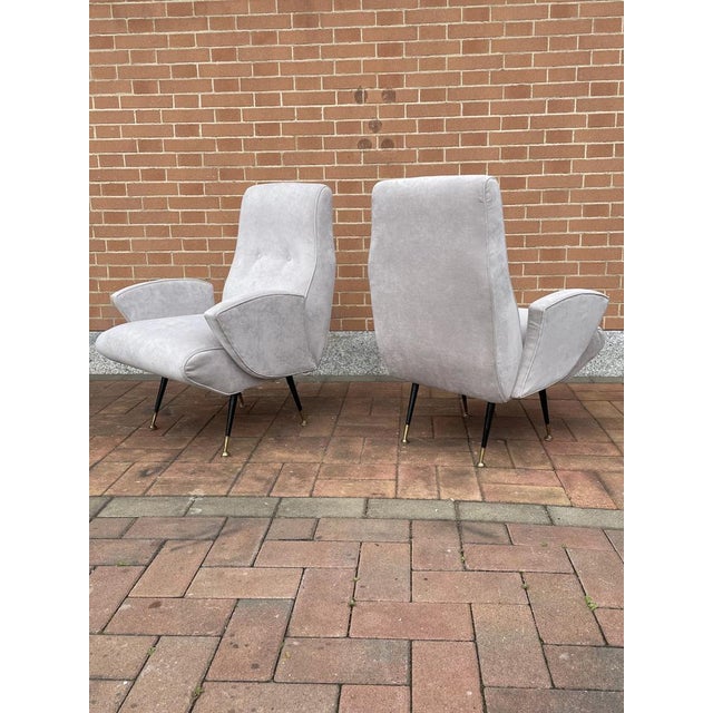 Pair of armchairs of the 1950s attributed to Nino Zoncada. They were entirely restored with the total renovation of the...