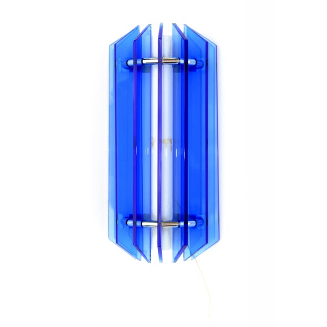 Stunning Blue Glass Blades Sconce by VECA with Chrome details, made in Italy in the late 60s. In perfect working condition...