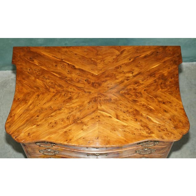 George iii ormolu-mounted burr & burl yew serpentine commode, england, circa 1765–1775 after john cobb. A particularly...