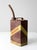 Late 1950s Huffy one-gallon metal gasoline can featuring bold diagonal graphics in deep brown and yellow. The compact...