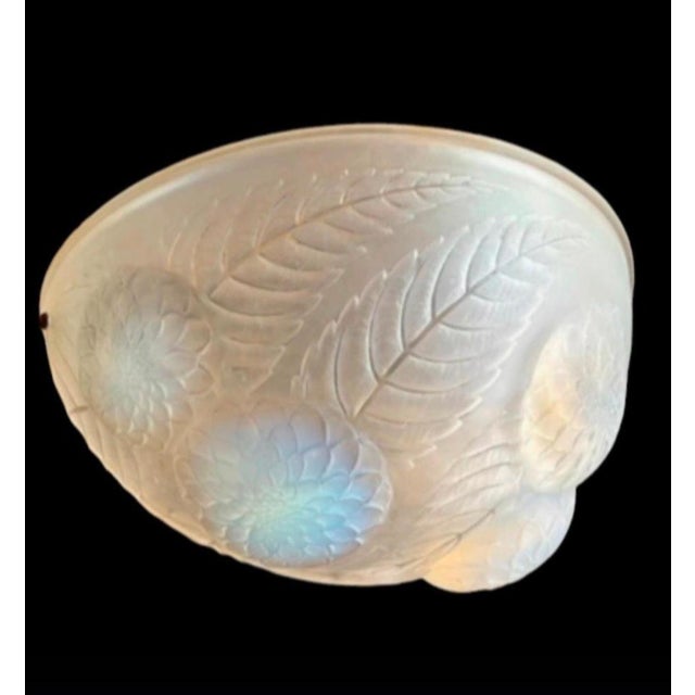 René Lalique Dahlias opalescent wall light makes sense because it combines iconic Art Deco design, strong decorative...