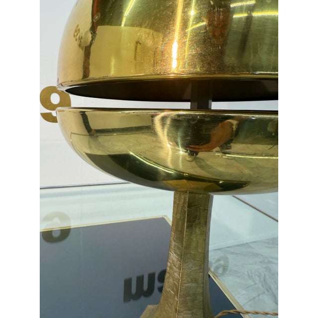 An exceptional mid-century modern brass table lamp with a bold sculptural presence. Featuring a split mushroom dome shade...