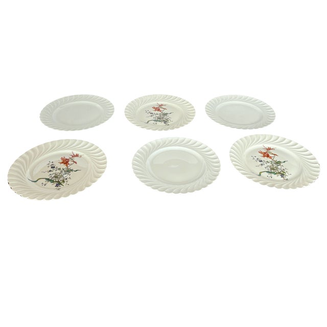 "A charming 12-piece porcelain dinnerware set by Haviland Limoges, France – ideal for intimate gatherings or collectors of...