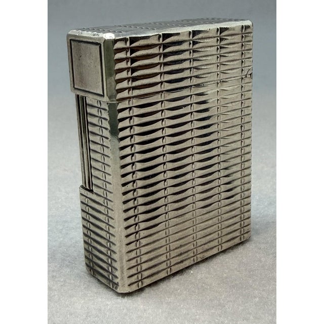 Iconic S. T. Dupont Ligne 1 Lighter. In original box with Guarantee, Instructions and Service Facilities. Horizontal...