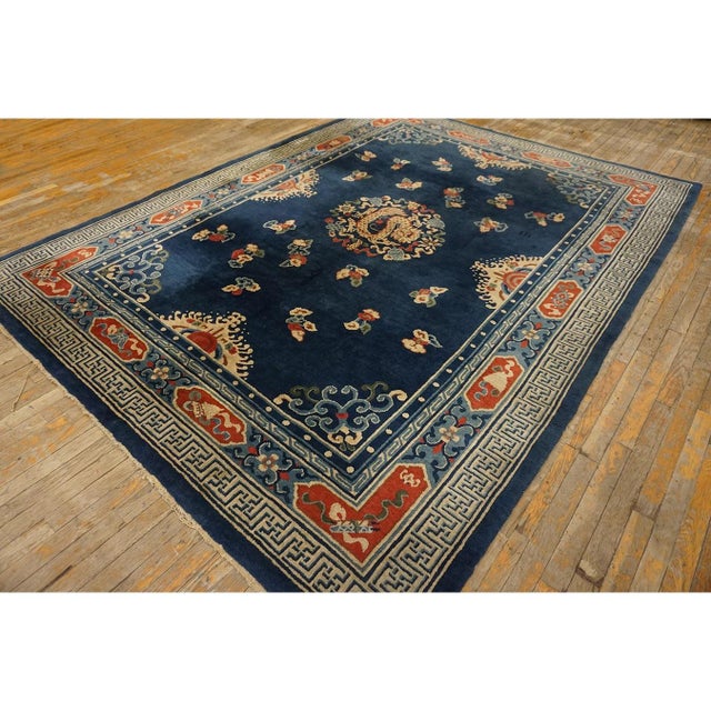 Hand Knotted Pile Rectangle Floral Medallion Antique Blue 1920s Wool Rug, Circa Date: 1920s. This exceptional piece of...