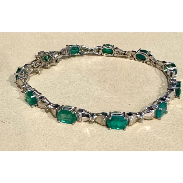 11 Carat Natural Emerald & 0.25 ct Diamond Cocktail Tennis Bracelet 14 Karat White Gold This exceptionally affordable...