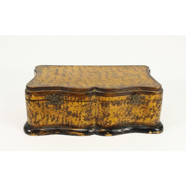 A very charming antique vanity box for jewelry, cosmetics and trinkets Beutiful wavy scrolled shape, well elaborated It is...