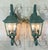 Elegant pair of solid brass wall lanterns. featuring a timeless French Quarter-inspired design. The lanterns feature a...