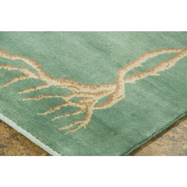 Hand-knotted in wool, this 3x7 contemporary runner celebrates the poetic beauty of Chinese Deco design. Set against a...