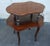 Very unusual French rosewood server table featuring two shaped tops connected by decorative turned supports, with...