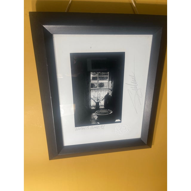 Original black-and-white photographic print by Giles Norman, titled “Window, 1992” as written in pencil on the mat. Signed...