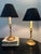 Handsome pair of Chapman Manufacturing candlestick table lamps featuring sculptural barley-twist columns, warm antiqued...