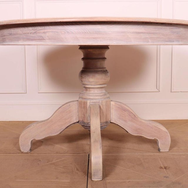 Good 19th C English bleached pine breakfast table. 1860 This piece is designed in the style of the selected designer...