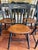 A rare and complete set of four (4) Ethan Allen dining chairs featuring the highly collectible "Deer and Willow" stencil...