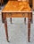 Late Federal Mixed Fruitwood Single Drawer Dropleaf Pembroke Table on wheels. The back of the table look exactly as the...