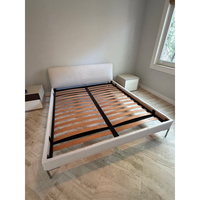 Charles platform bed frame by B&B Italia. Internal frame:tubular steel, External feet: bright brushed chrome die-cast...