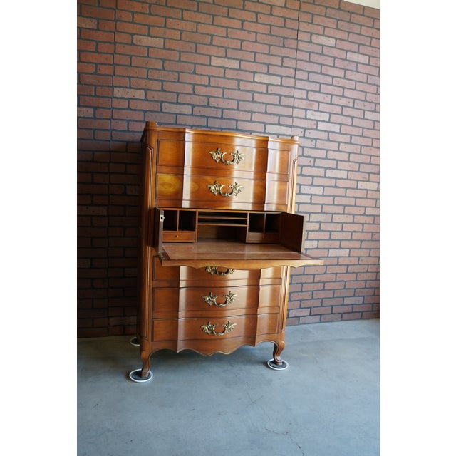 Refined elegance showcasing sophistication without stuffiness. Finely crafted of Cherry by John Widdicomb this secretary...