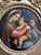 A fine Italian 19th Century Oil Painting on canvas. “La Madonna della Seggiola” after Raphael. This painting is a 19th...